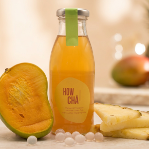 3226faf2-fab3-4cda-bbef-1c67bf65f6cc HowCha Mango and Pineapple Flavoured Jasmine Green Tea with Lychee Flavoured Popping Balls